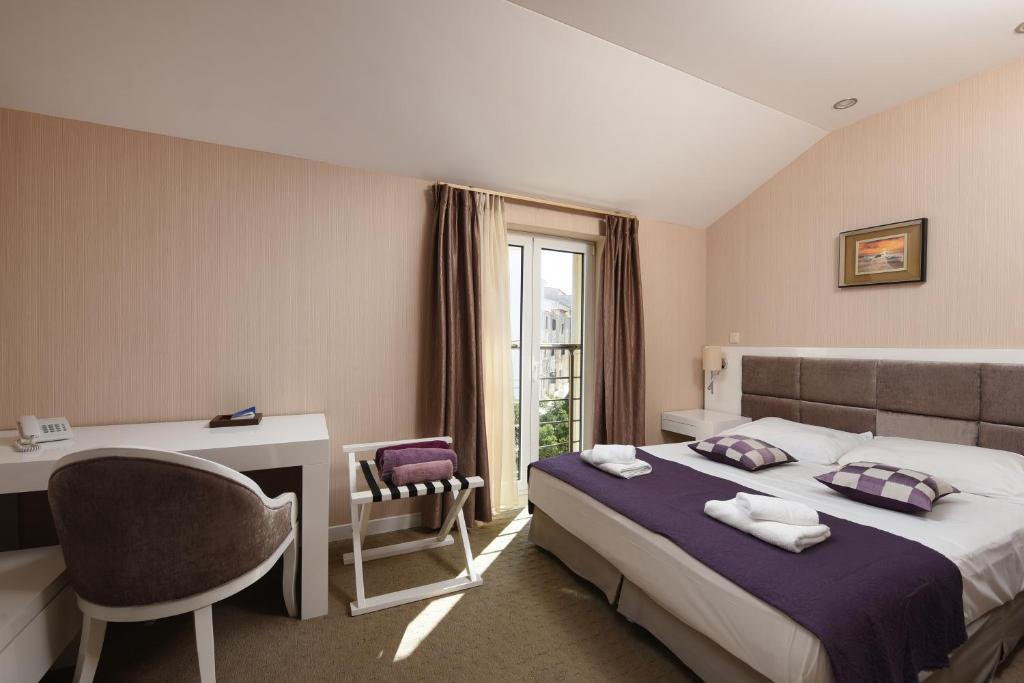 Krevet ili kreveti u jedinici u objektu Family Hotel Zanè
