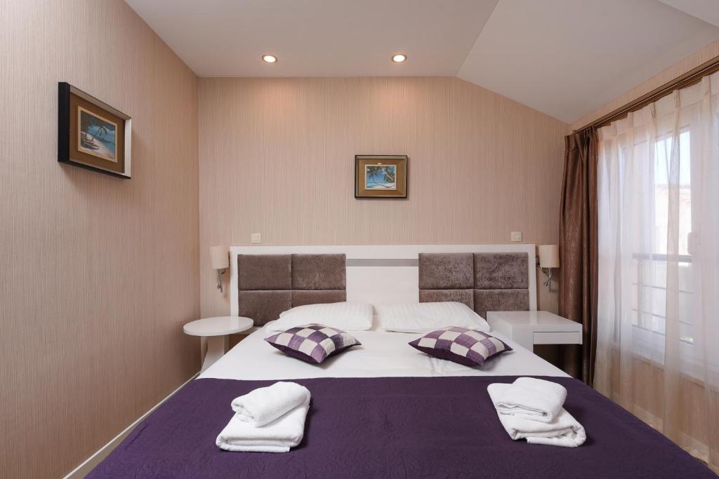 Krevet ili kreveti u jedinici u objektu Family Hotel Zanè