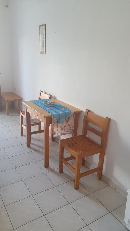 Posezení v ubytování NIKOS APARTMENTS