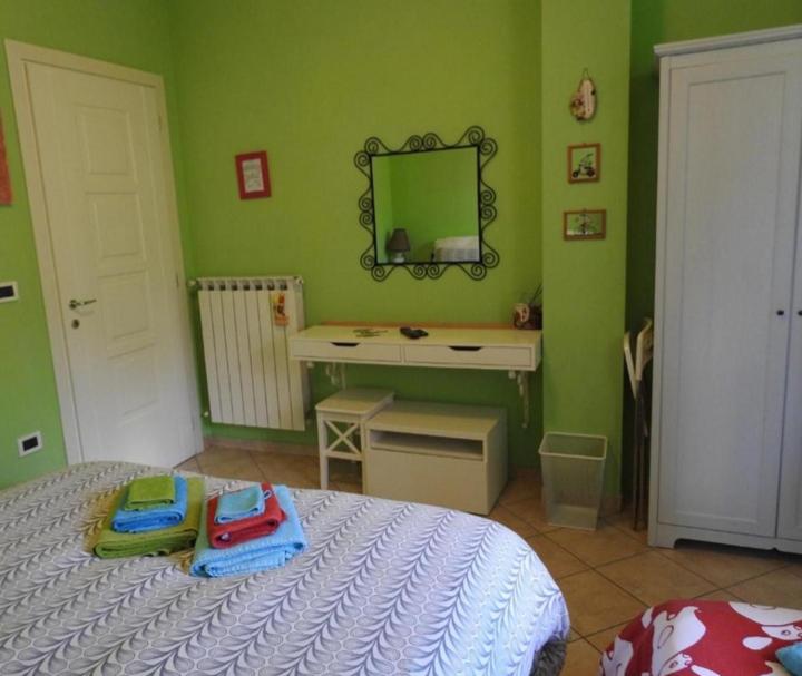 Posteľ alebo postele v izbe v ubytovaní Iris Casa Vacanze