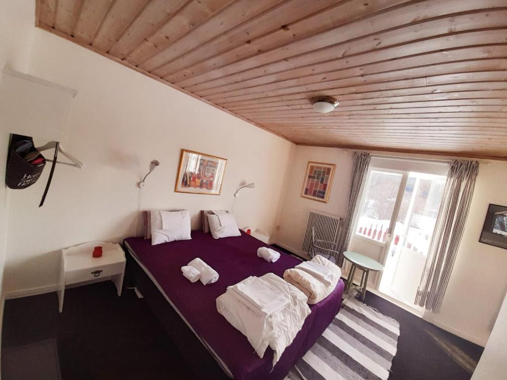 Кровать или кровати в номере WasaFjällgård