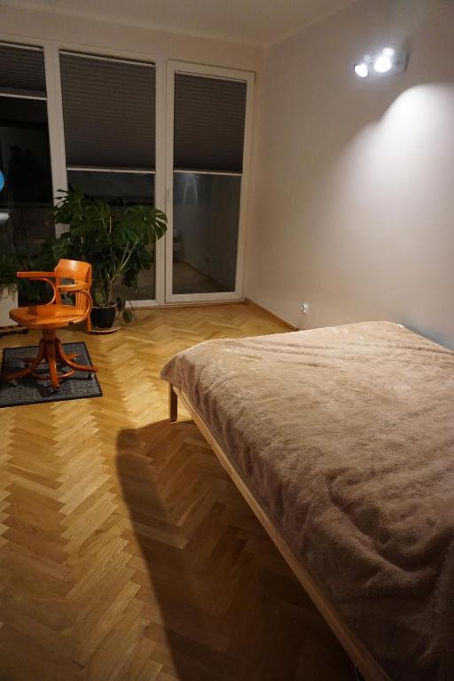 Posteľ alebo postele v izbe v ubytovaní Kwatera Kapitańska