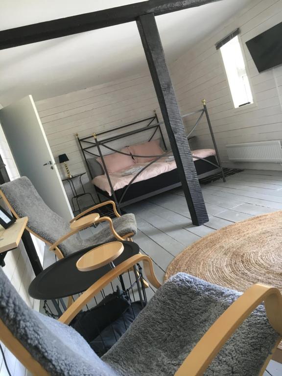 Postel nebo postele na pokoji v ubytování Galleriet BnB