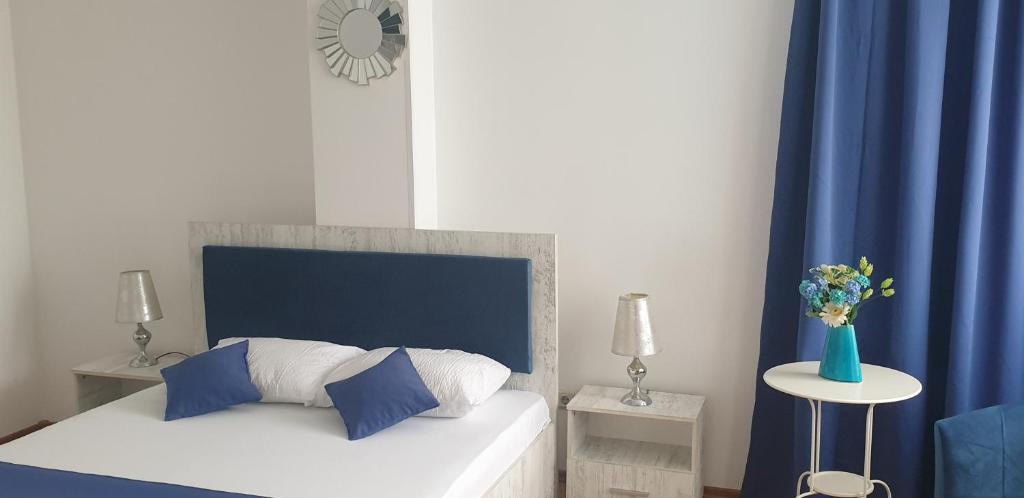 Postel nebo postele na pokoji v ubytování Hotel Allegro