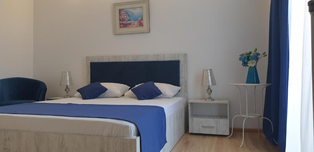Postel nebo postele na pokoji v ubytování Hotel Allegro