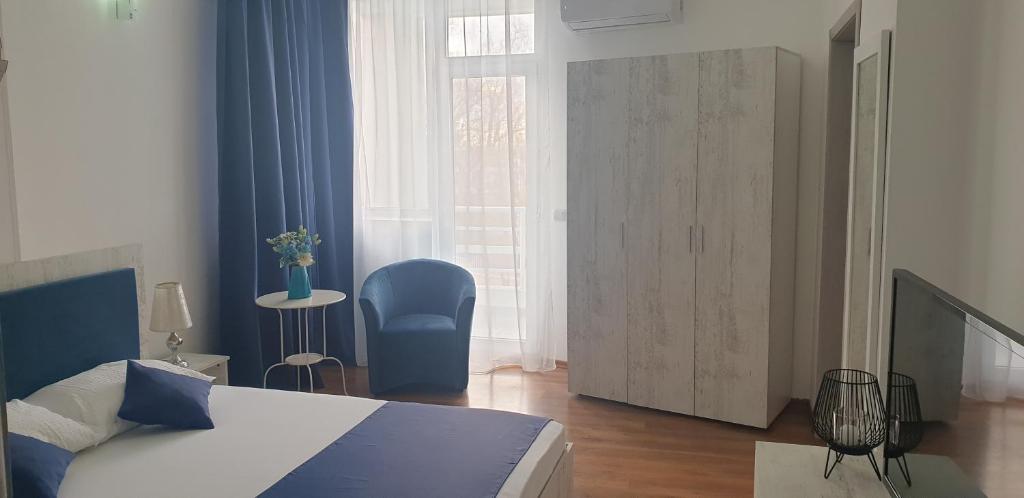 Postel nebo postele na pokoji v ubytování Hotel Allegro