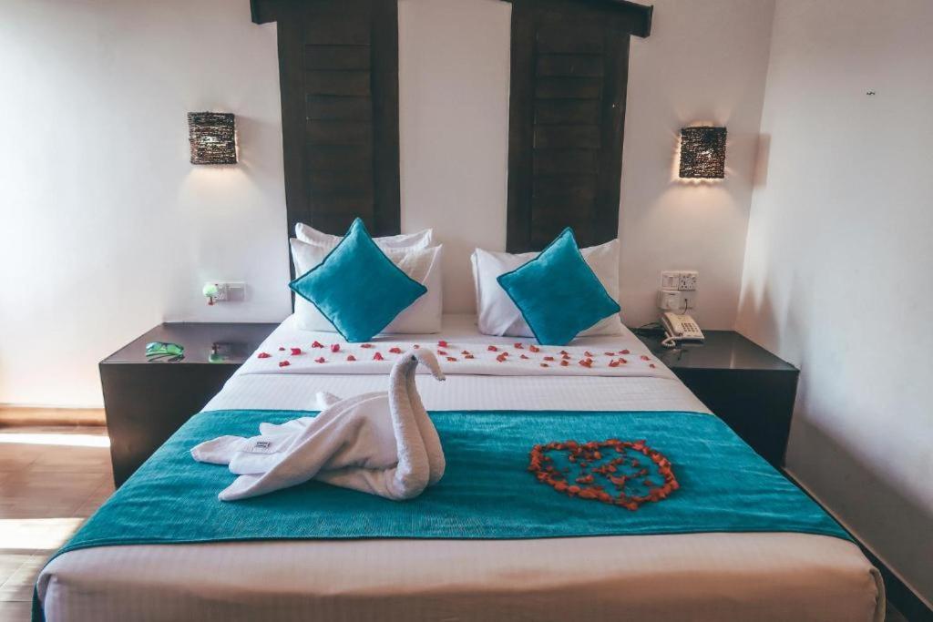 Postel nebo postele na pokoji v ubytování Sunshine Resort & Spa Sigiriya