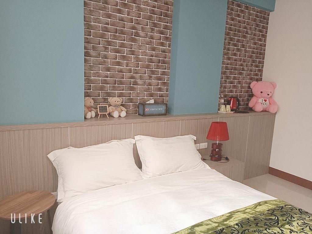 Postel nebo postele na pokoji v ubytování Happy Life B&B