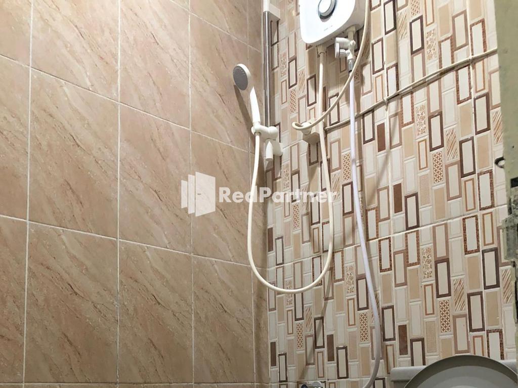 Koupelna v ubytování Seungit Syariah Inn Tebet Mitra RedDoorz