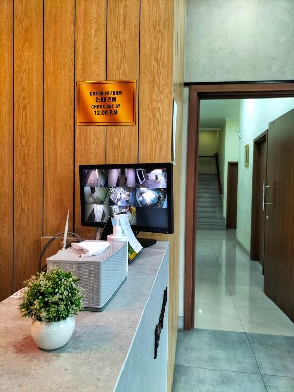 TV a/nebo společenská místnost v ubytování Cozy Residence Tomang