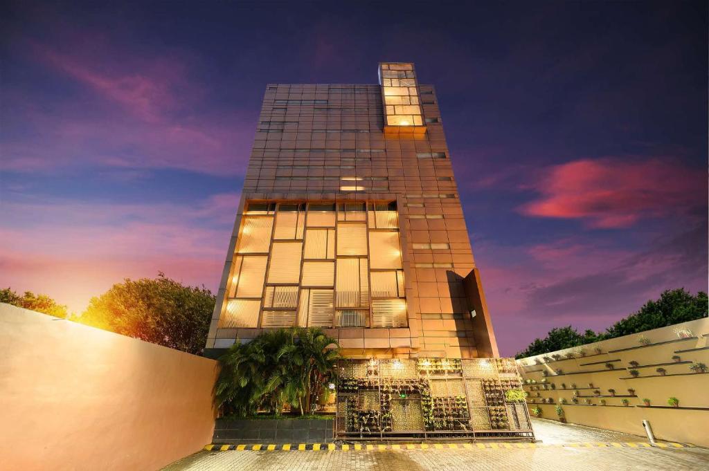 a tall building with a fence in front of it at Capitol Residency in Rānchī