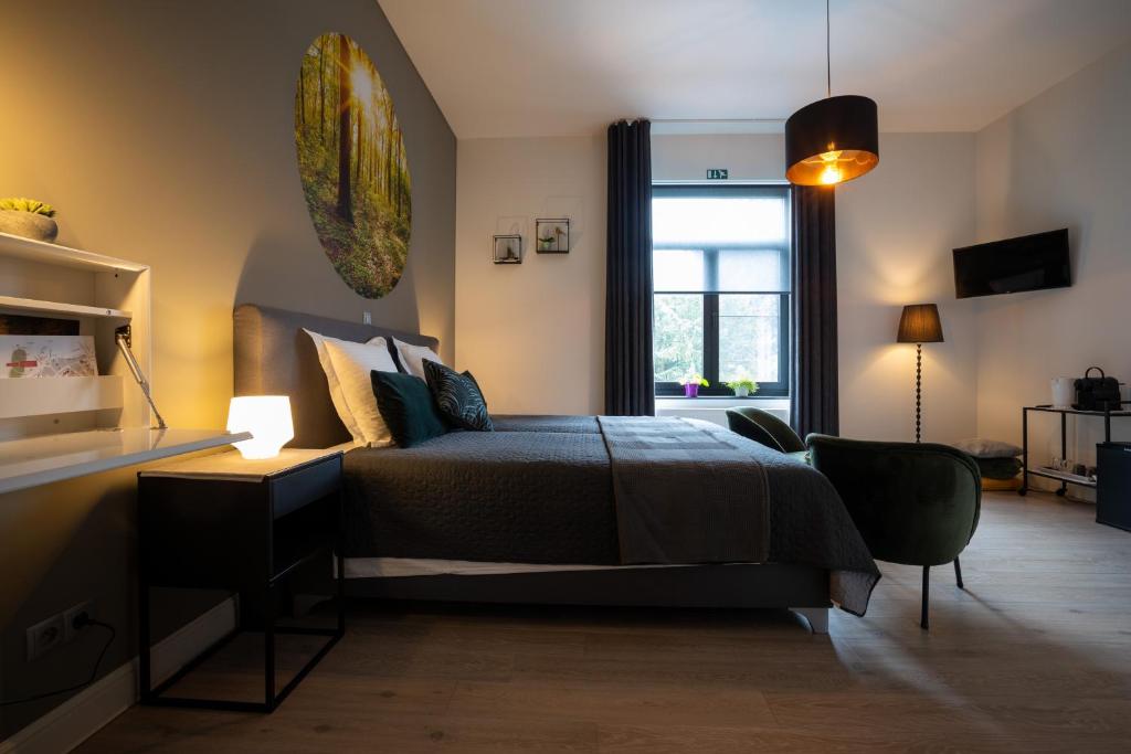 Postel nebo postele na pokoji v ubytování B&B Gaudium XII