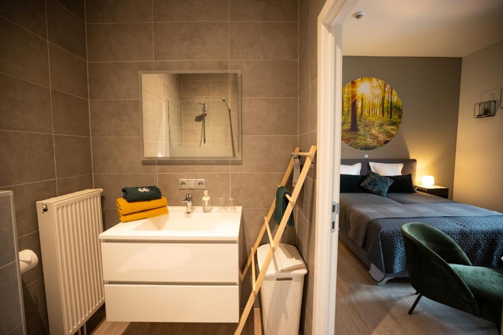 Postel nebo postele na pokoji v ubytování B&B Gaudium XII