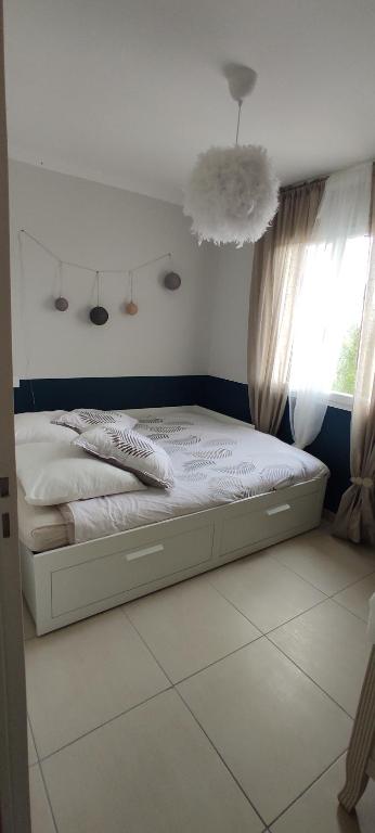 Кровать или кровати в номере Villa bellevue