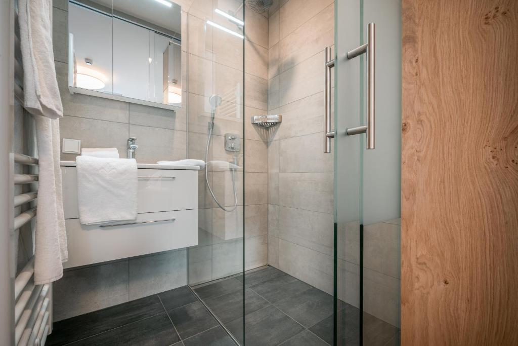 Koupelna v ubytování Das Conrad by Schladming-Appartements