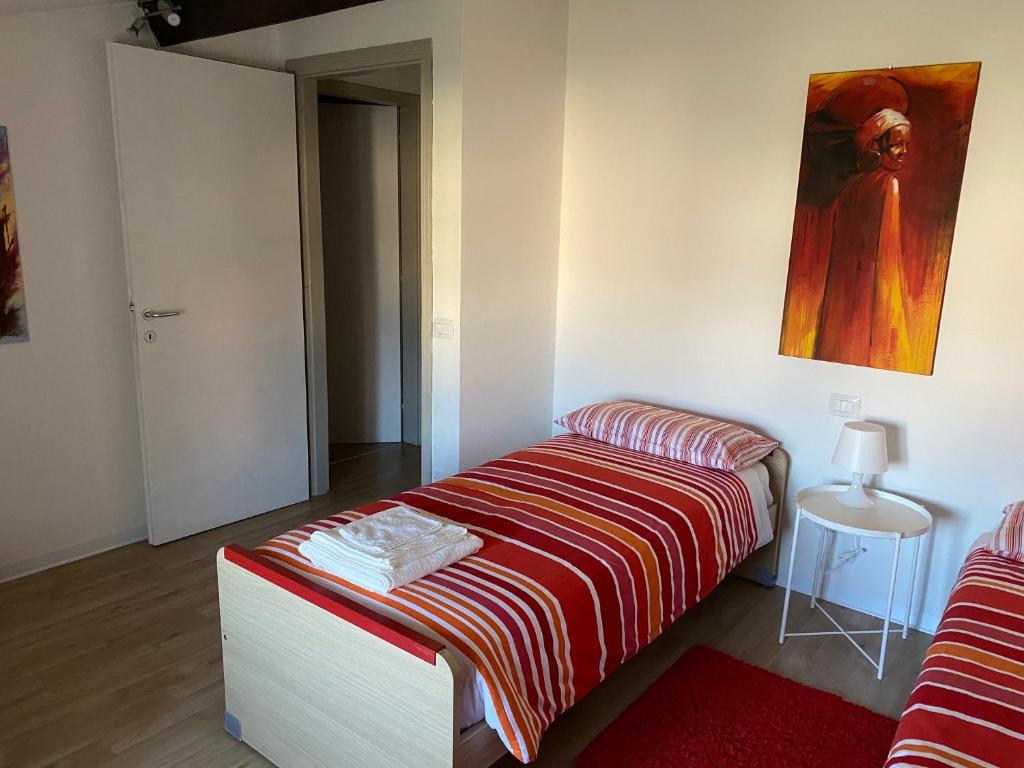 Posteľ alebo postele v izbe v ubytovaní La casa di Manu
