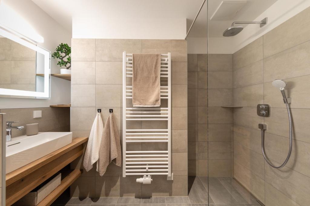 Koupelna v ubytování Das Conrad by Schladming-Appartements