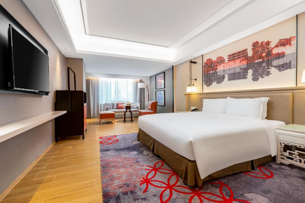 TV a/nebo společenská místnost v ubytování voco Guangzhou Shifu by IHG