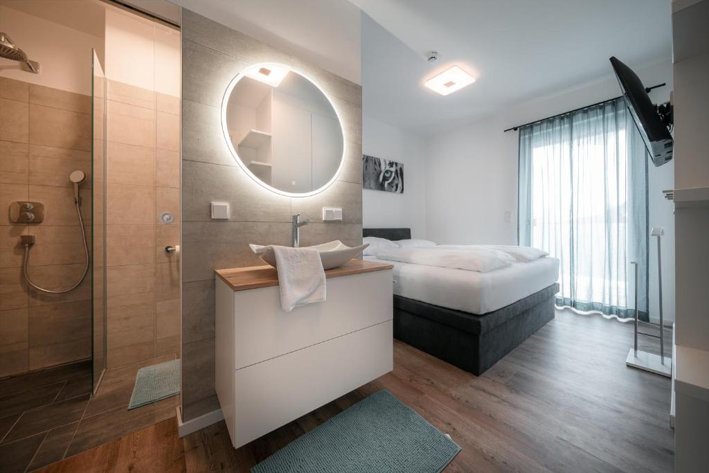 Postel nebo postele na pokoji v ubytování Das Conrad by Schladming-Appartements