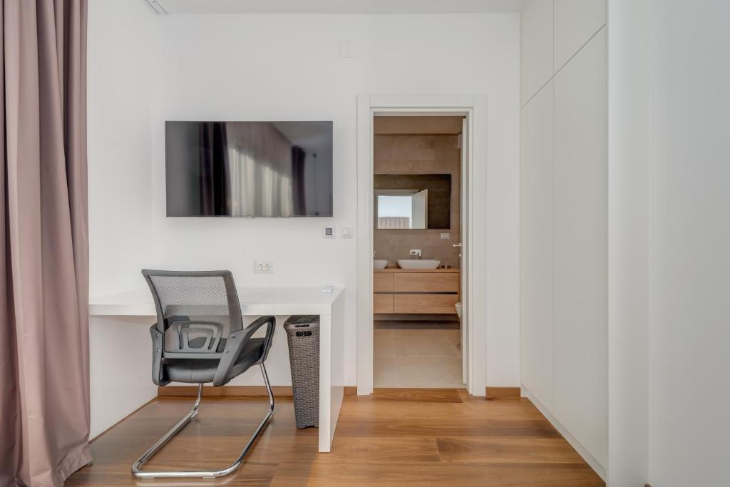 TV a/nebo společenská místnost v ubytování Sea Bliss Luxury Villa - Sevid