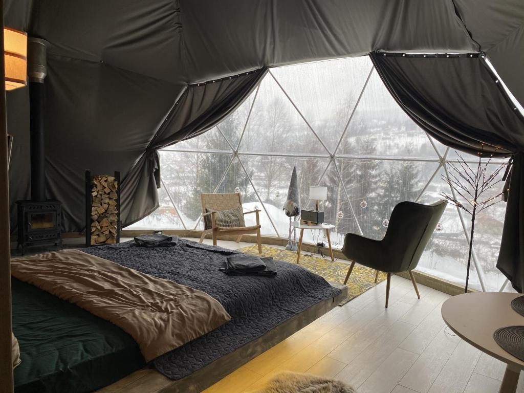 Postel nebo postele na pokoji v ubytování SlavskoGlamping