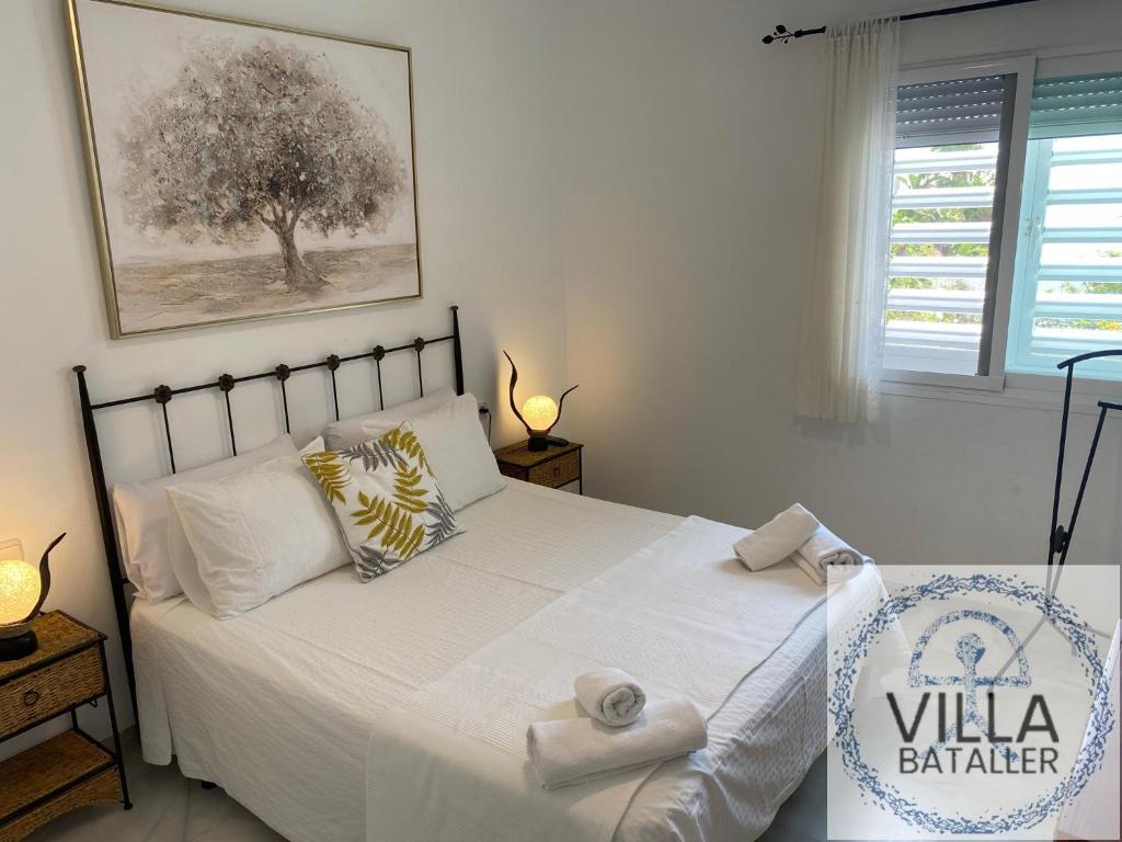 Posteľ alebo postele v izbe v ubytovaní Villa Bataller I