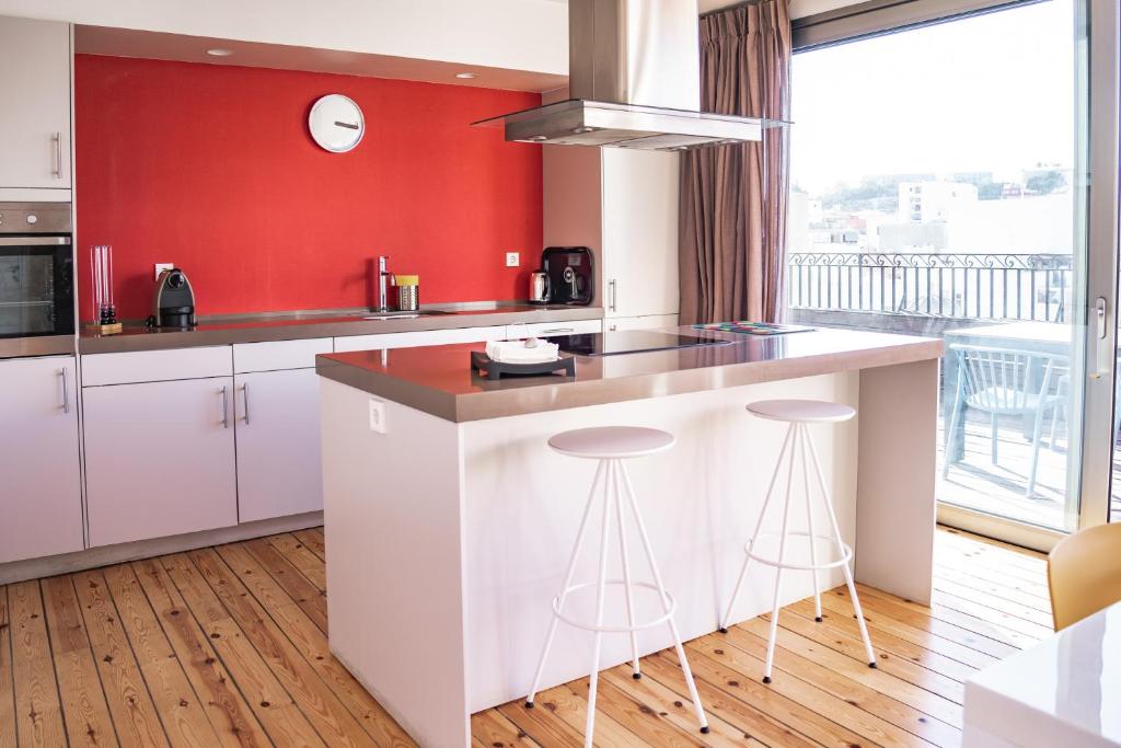 Kuchyň nebo kuchyňský kout v ubytování Apartamentos Alfonso X