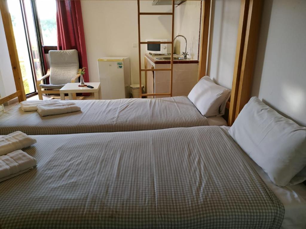 Cama o camas de una habitación en Centro de Naturaleza Cañada Verde "El Parque de Naturaleza con mas experiencias de Andalucía""