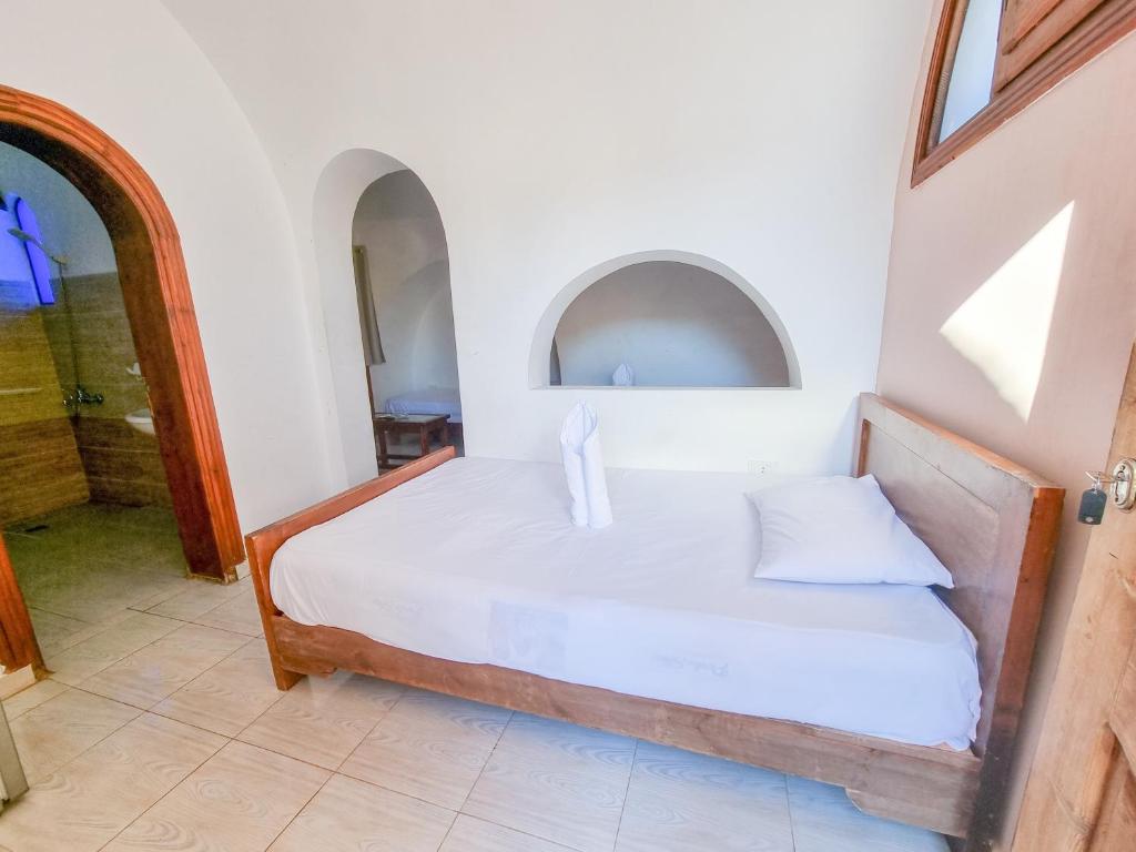 Postel nebo postele na pokoji v ubytování Coral Reefs Hotel Dahab