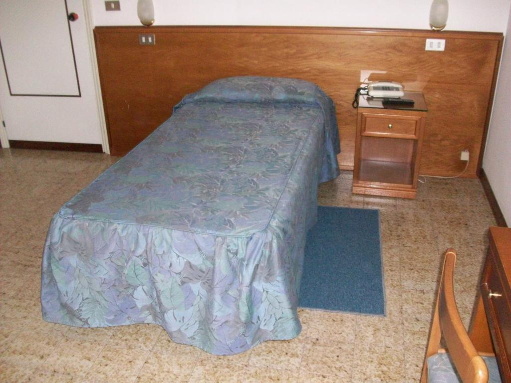 Postel nebo postele na pokoji v ubytování HOTEL SANTOROTTO di FABIO TERROSI