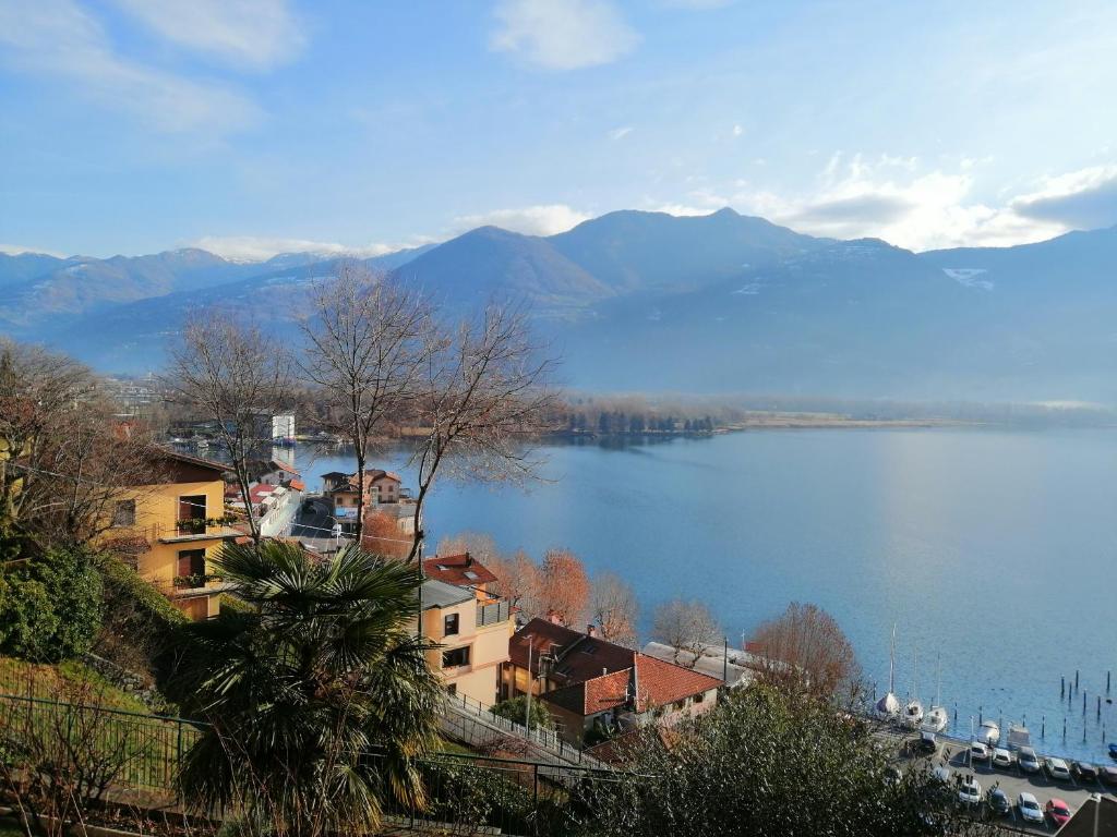 a view of a lake with mountains in the background at Castello Lovere appartamenti in Lovere