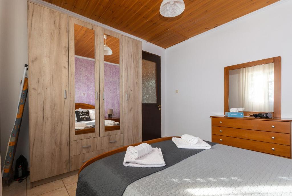 Postel nebo postele na pokoji v ubytování Serenity House