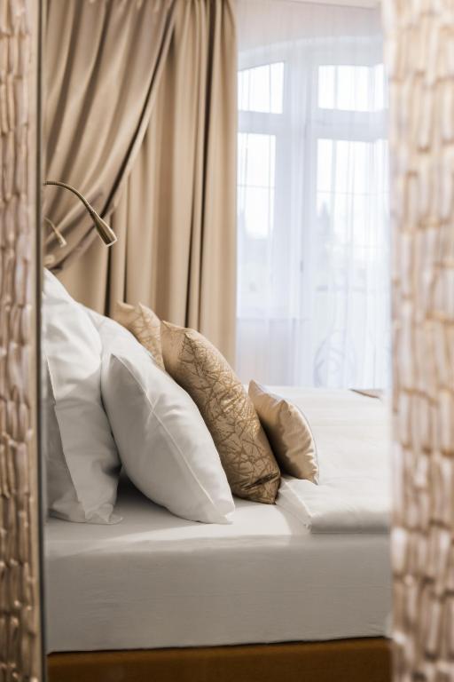 Postel nebo postele na pokoji v ubytování Hotel SEN