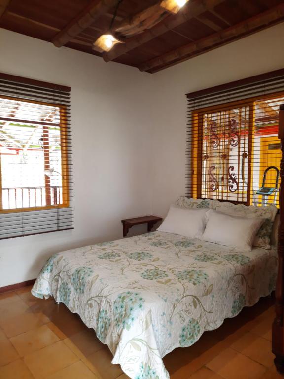 Voodi või voodid majutusasutuse FINCA HOTEL DON JULIO toas