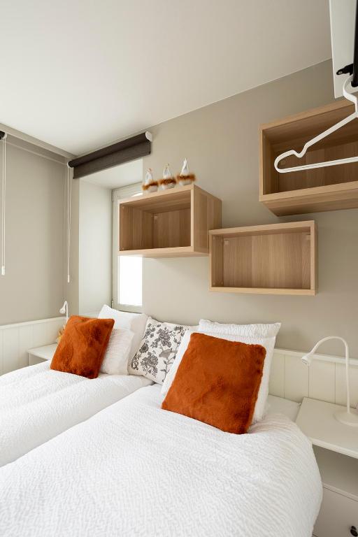 Postel nebo postele na pokoji v ubytování Enjoytoday vakantiewoning 45