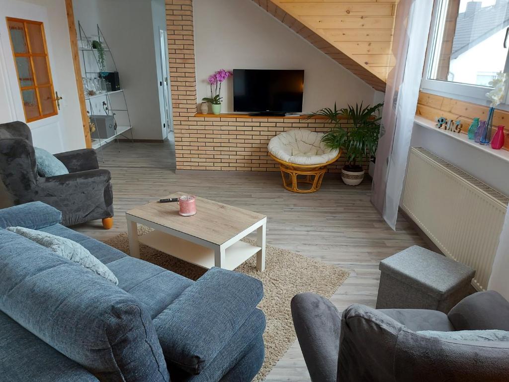 Χώρος καθιστικού στο Ferienwohnung am Lieserpfad