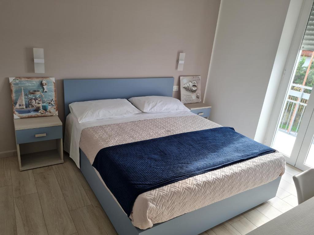 Postel nebo postele na pokoji v ubytování B&B Rayl