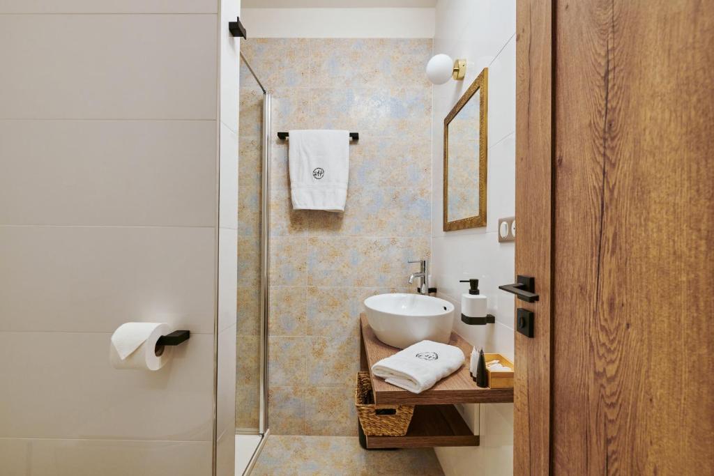 Koupelna v ubytování Hotel Alfréd a Hermína
