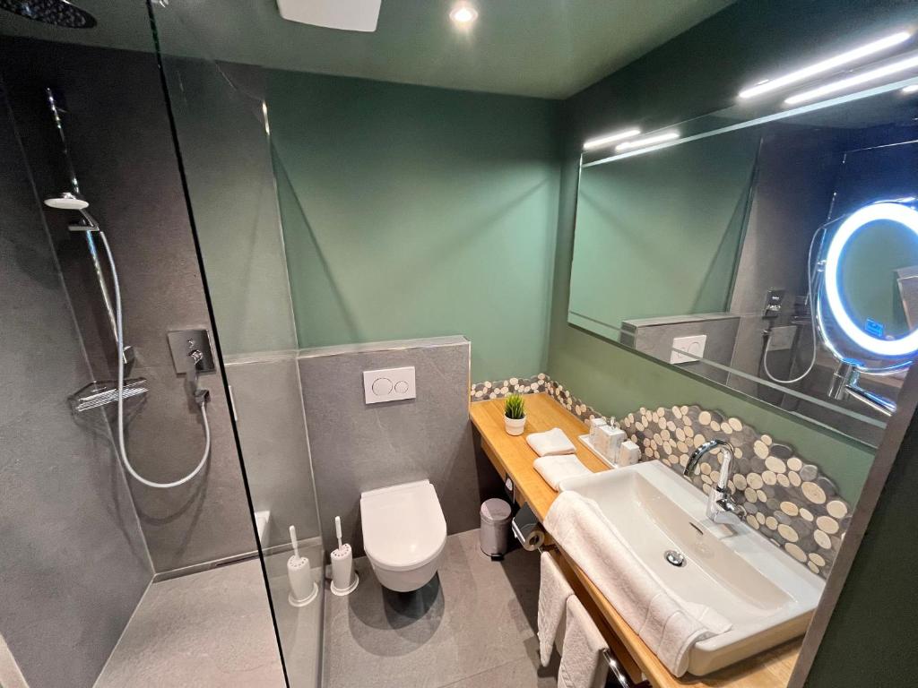 Koupelna v ubytování Hotel Garni Brunnthaler