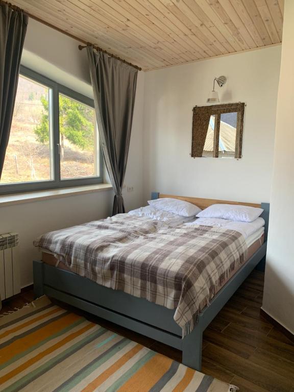 Ein Bett oder Betten in einem Zimmer der Unterkunft M.A.K.home