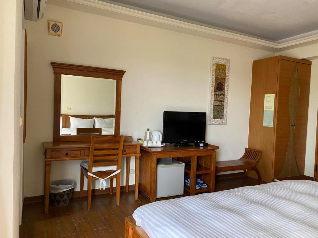 TV a/nebo společenská místnost v ubytování Mamalulu Hostel