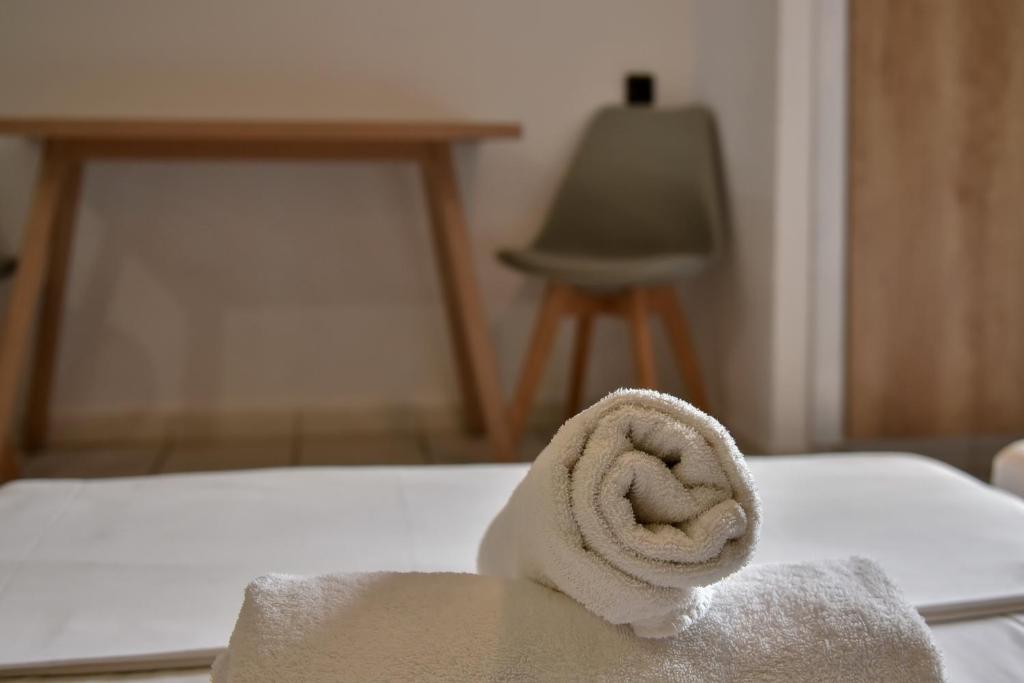 Postel nebo postele na pokoji v ubytování Iraklis Apartments