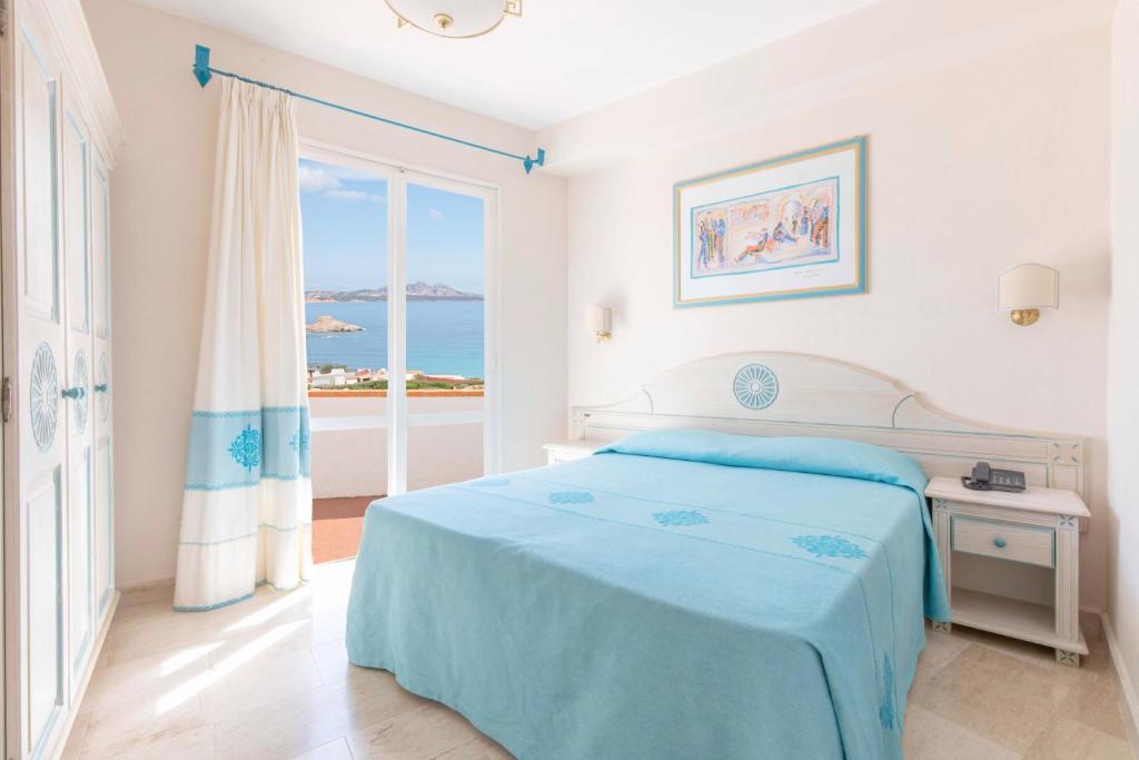 Posteľ alebo postele v izbe v ubytovaní Club Hotel Cormorano