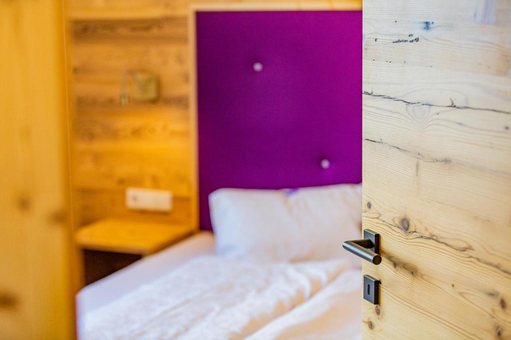 Postel nebo postele na pokoji v ubytování Landhaus Kirchgasser