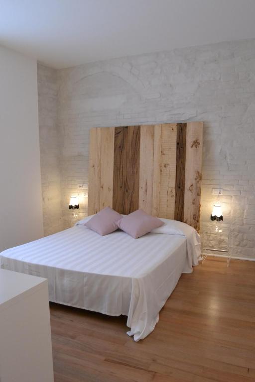 Postel nebo postele na pokoji v ubytování Albergo Il Rientro