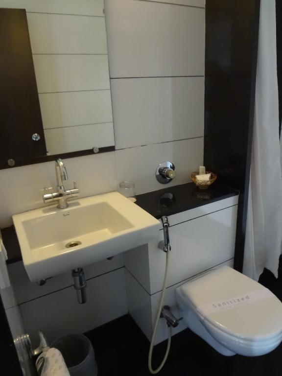 Koupelna v ubytování Shantai Hotel