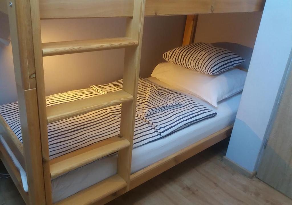 Posteľ alebo postele v izbe v ubytovaní Apartamenty-Obok