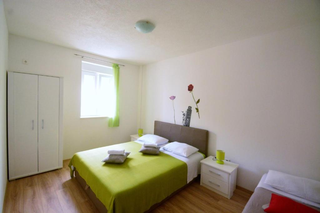 Posteľ alebo postele v izbe v ubytovaní Kala and Tina apartments
