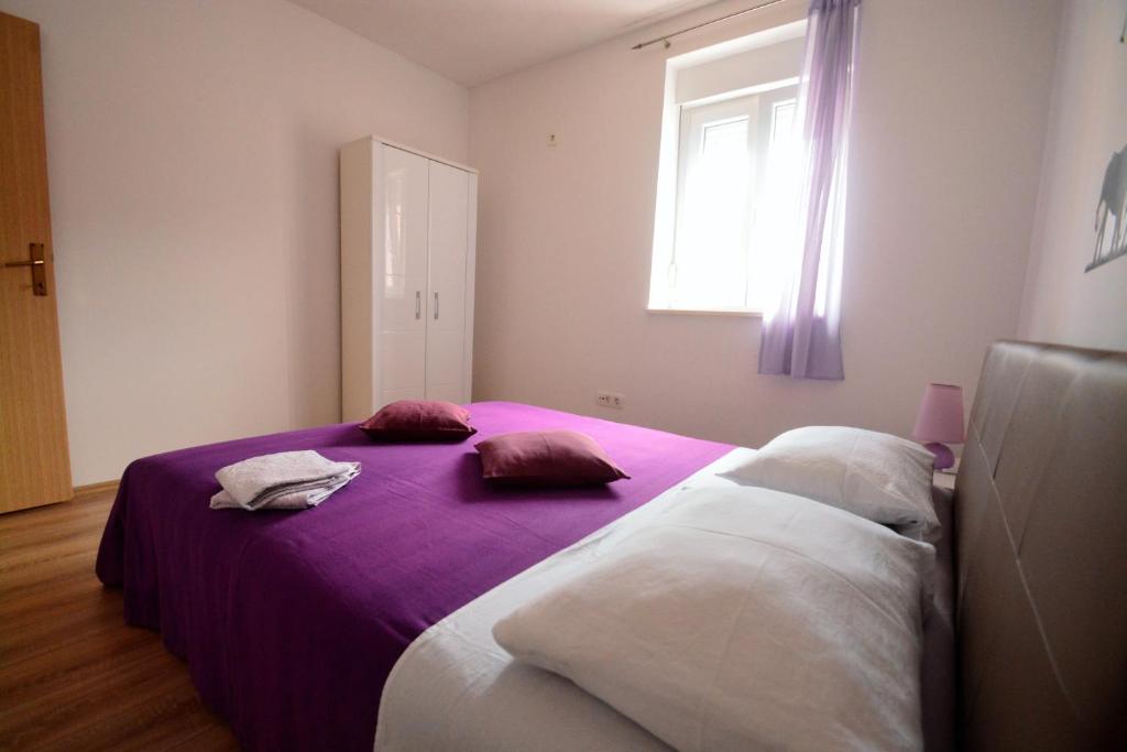 Posteľ alebo postele v izbe v ubytovaní Kala and Tina apartments