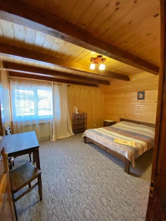 Postel nebo postele na pokoji v ubytování Faina House